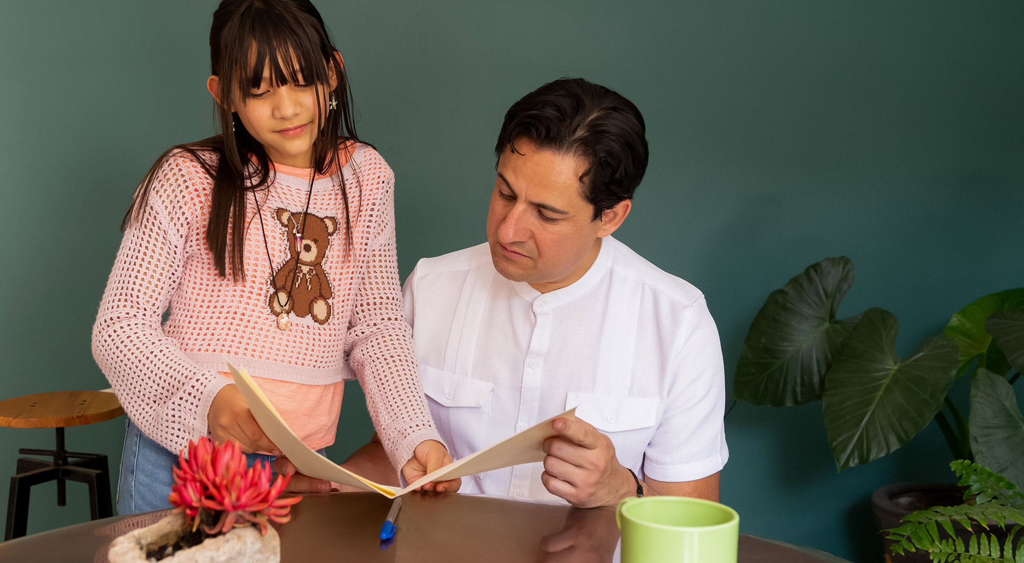 Parent reviewing school evaluation and IEP documents