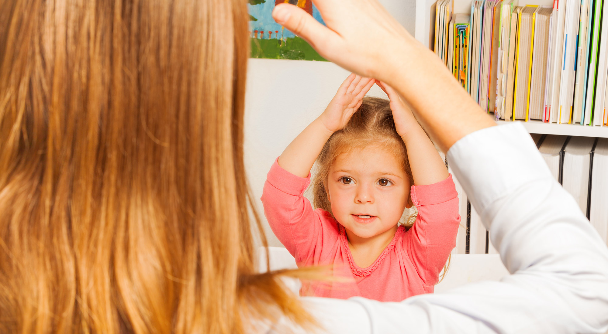 Child participating in an in-home ABA therapy session with a behavioral therapist