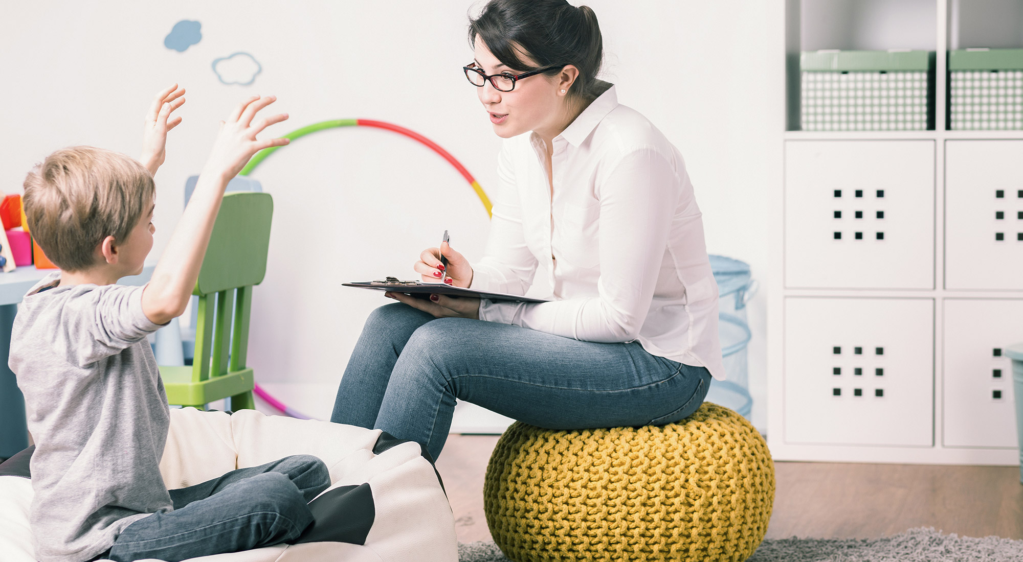 Registered Behavior Technician working with a child during an ABA therapy session