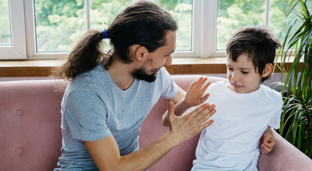 Child and family participating in an inclusive autism acceptance community