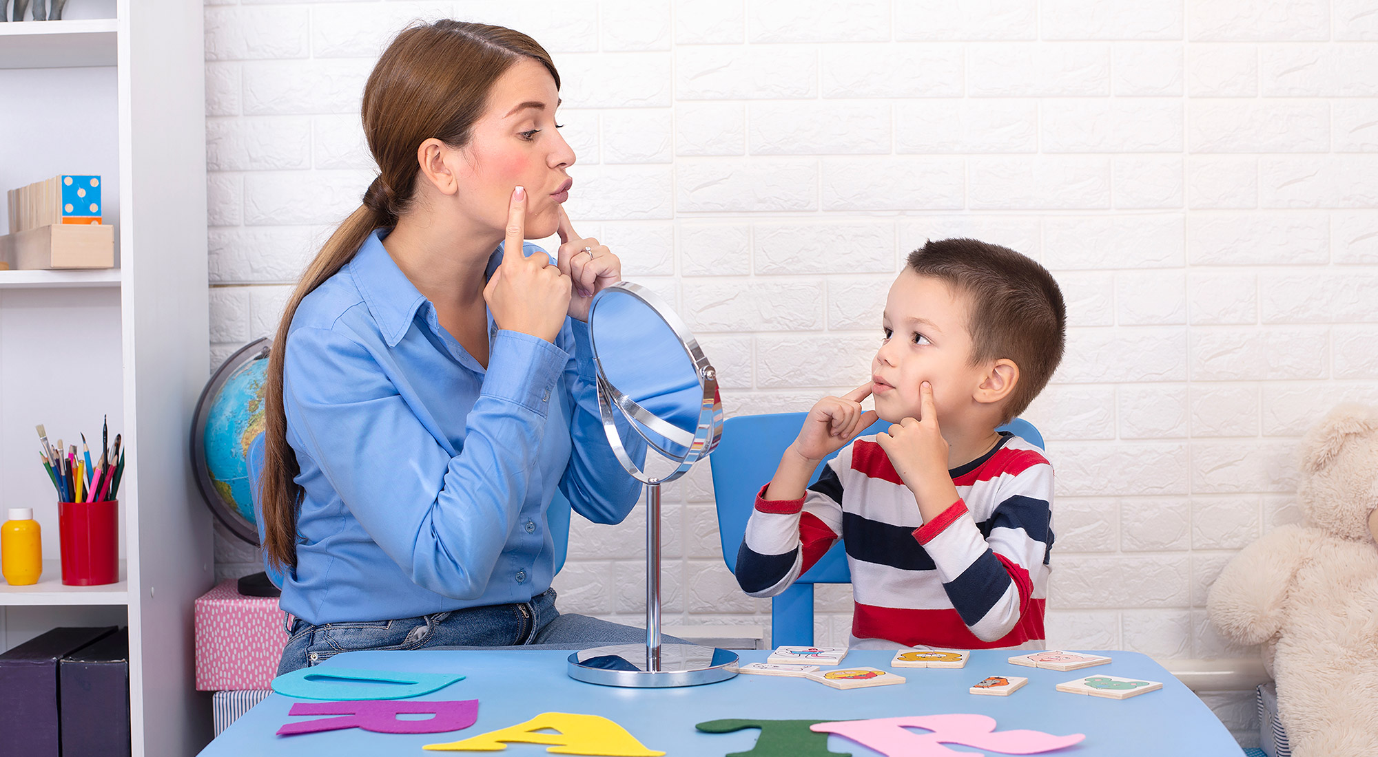 Child participating in an ABA therapy session with a therapist at home