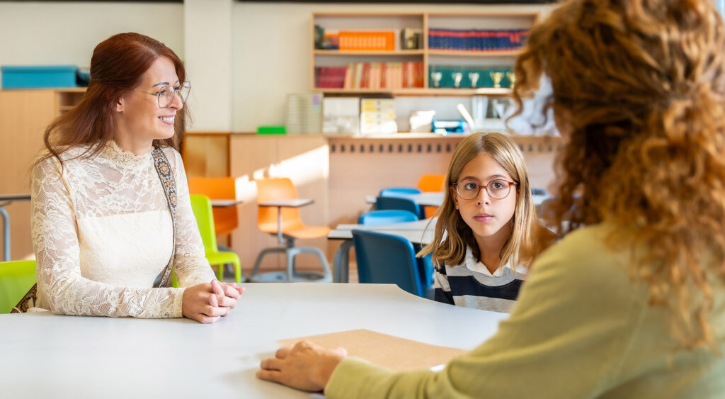 Parent and school team discussing a child’s Individualized Education Program